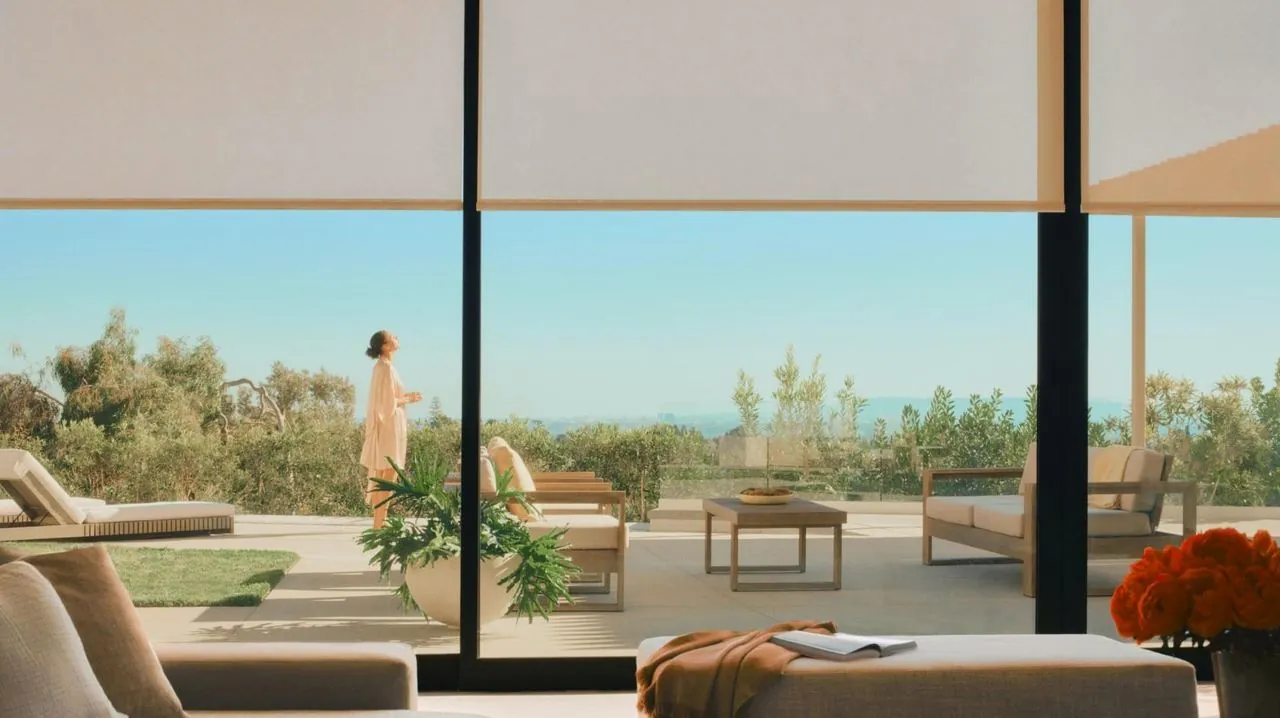 Sheer motorized shades framing a terrace view