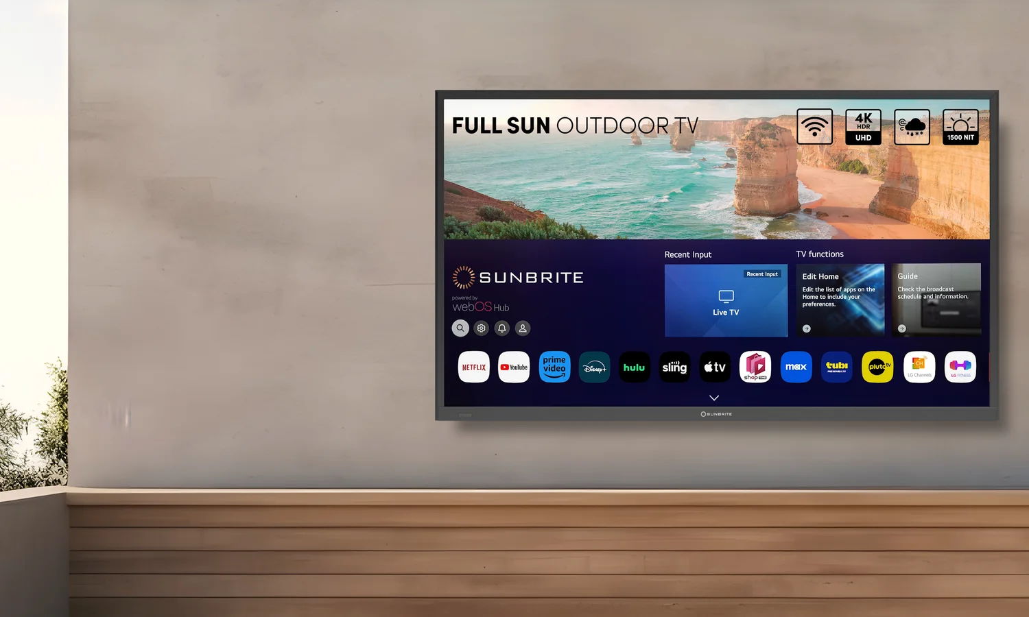 A television on an exterior wall in full sun beside a wet bar