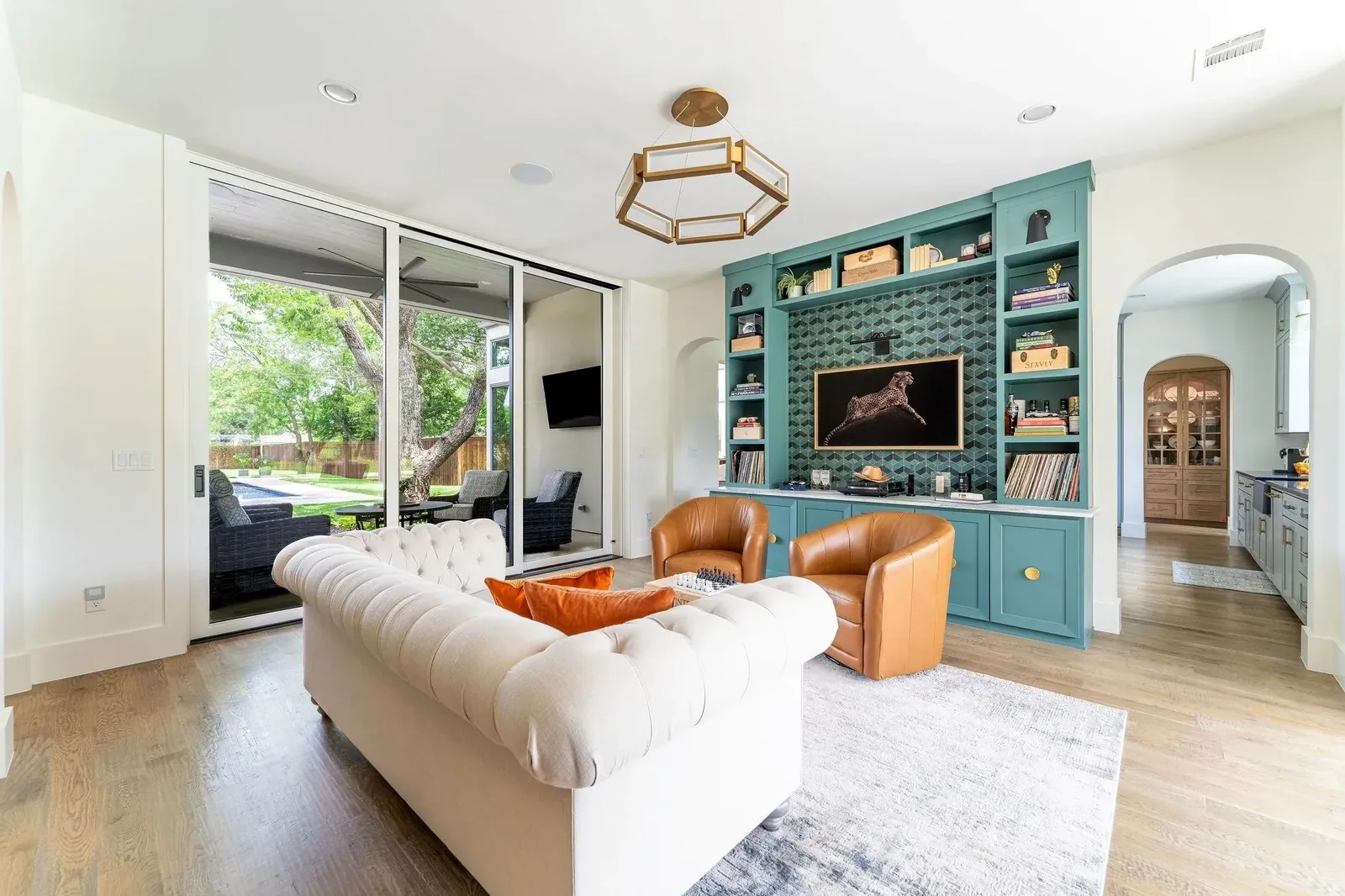 Built in with the cabinetry, not mounted onto it.